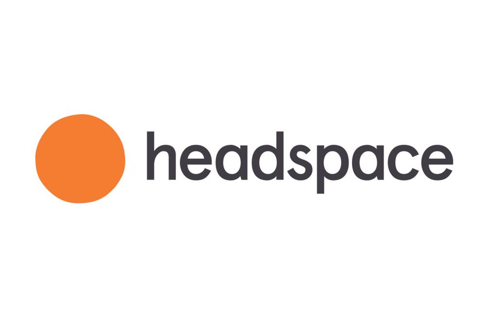 Headspace logo featuring an orange circle to the left of the word "headspace" in lowercase gray letters on a white background, symbolizing wellbeing.