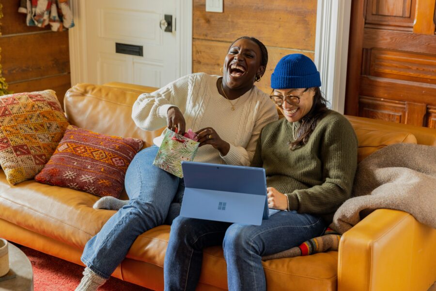 Two women laughing together