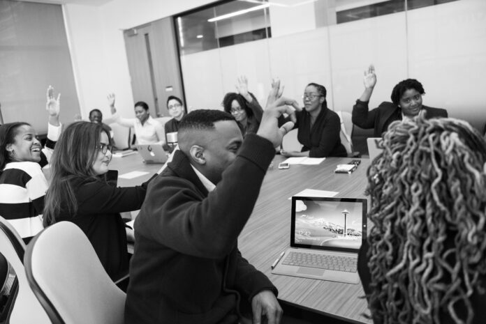 People of different ethnic groups at a work meeting.