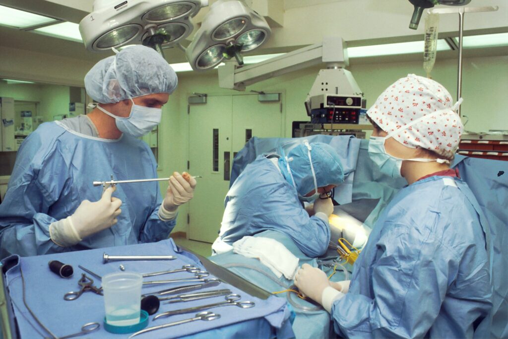 Medica staff working in an operating theatre