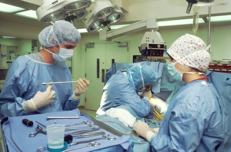 Medica staff working in an operating theatre