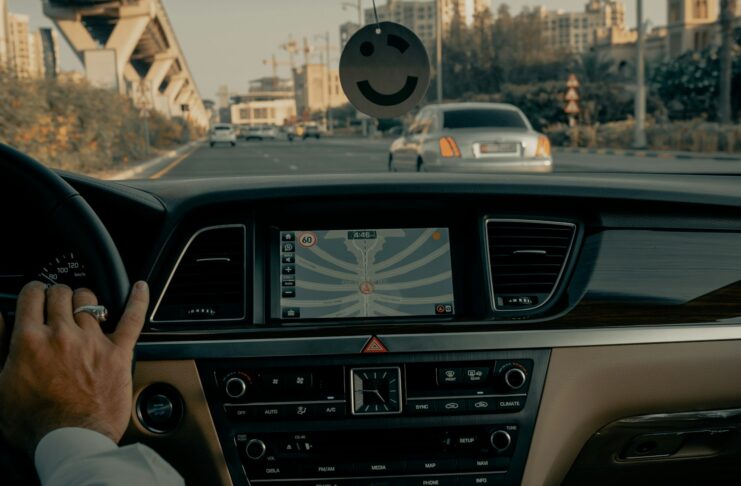 person driving car during daytime