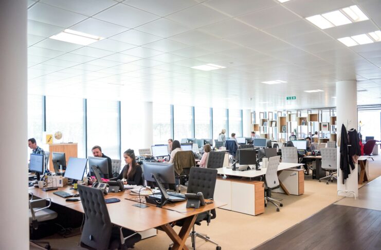 People in an open-plan office.