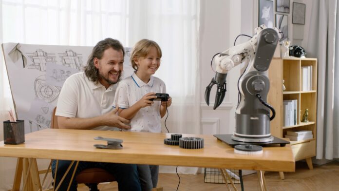 A man and a child are sitting at a table