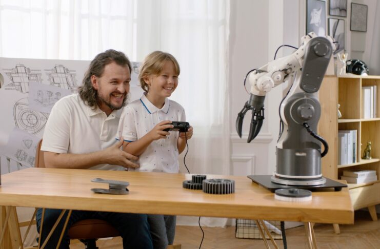 A man and a child are sitting at a table