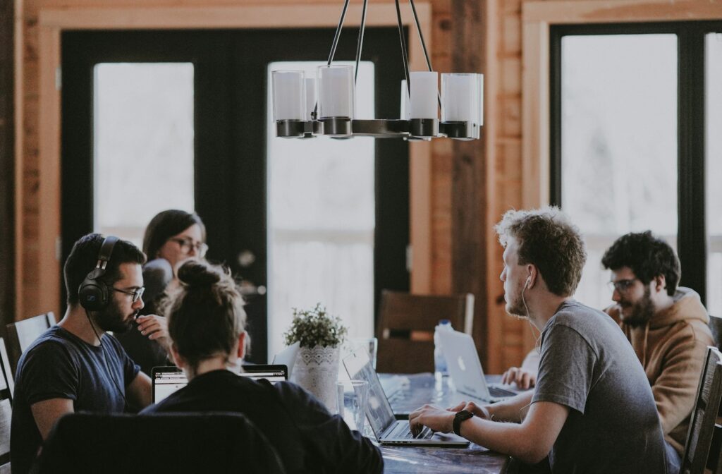 People sitting around an office table.