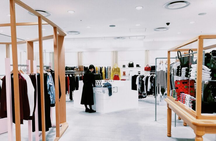 A retail worker in a clothing store.