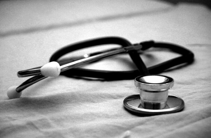 A black and gray stethoscope.