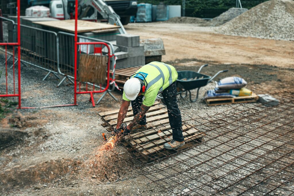 A man works at a construction site.