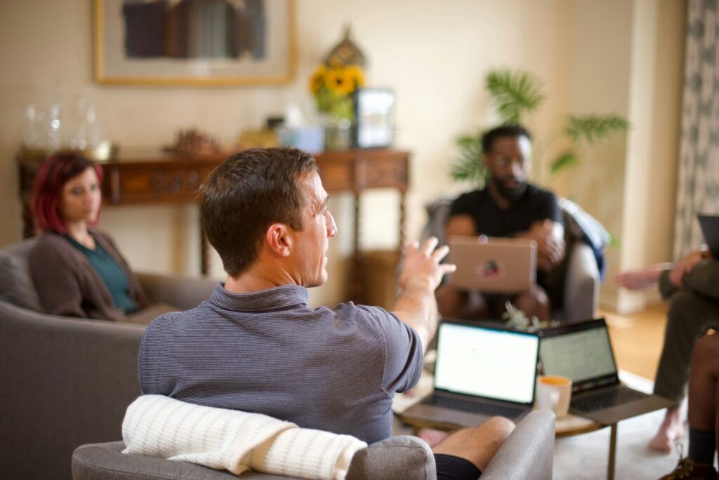 People meeting in a relaxed office setting.
