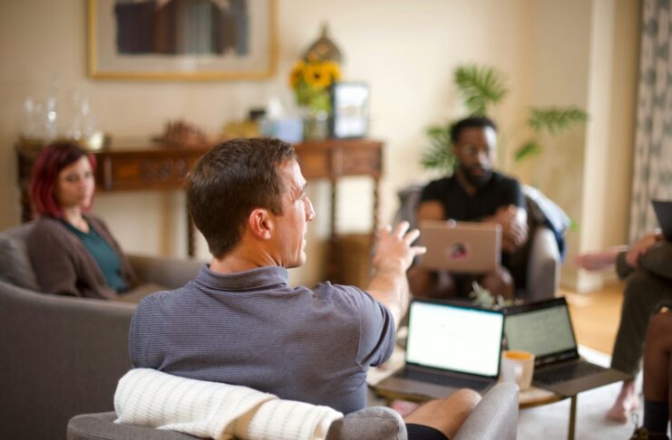 People meeting in a relaxed office setting.