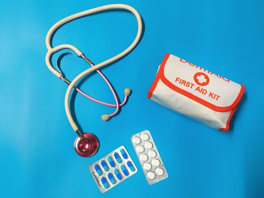 Packs of pills, a stethoscope and a first aid kit.