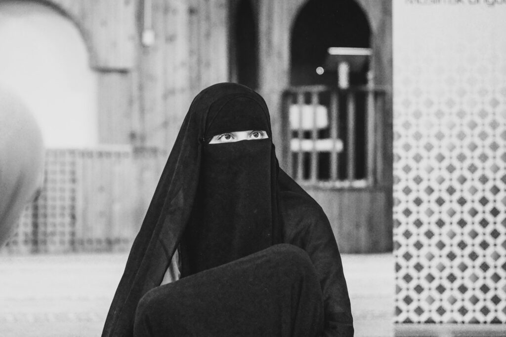 A woman in a burka.