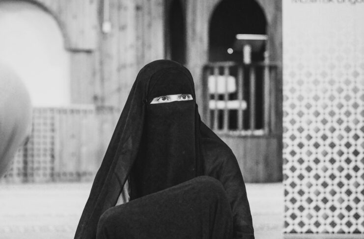 A woman in a burka.