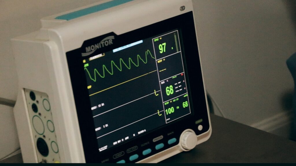 A hospital heart monitor displays information.