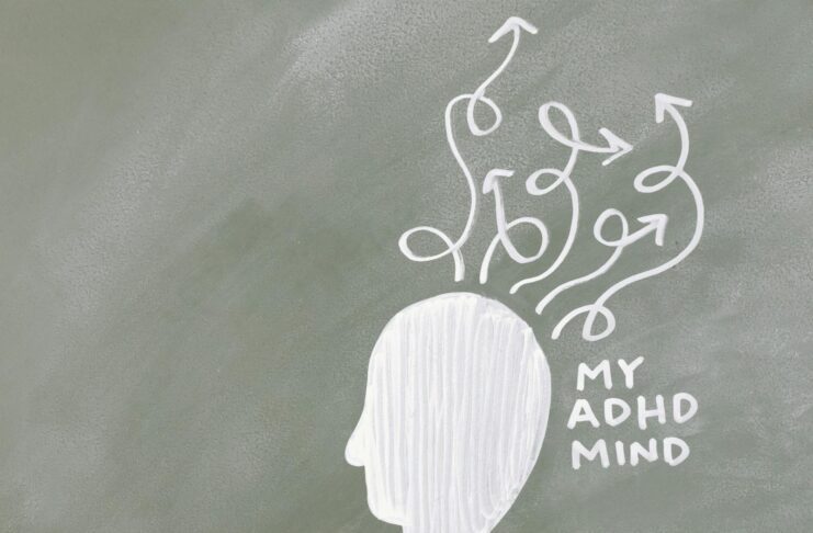 Creative depiction of the ADHD mind with chalk arrows on a grey board.