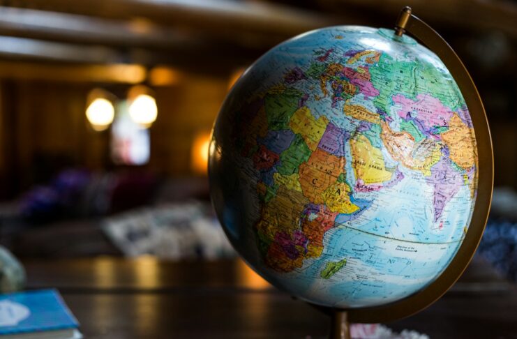 A desk globe on a table.