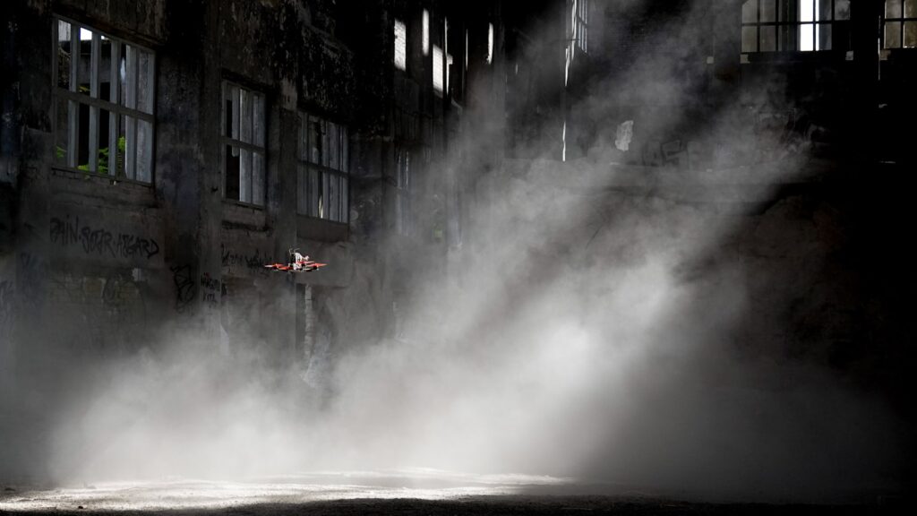 Dust in a room revelaed by a stream of sunlight from a window.