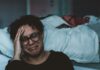 Work Offers a Lifeline To Unpaid Carers – But ‘Nearly Half May Cut Hours or Quit Without Support’ person crying beside bed