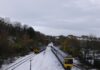 Cold Weather Risks at Work as Snow and Ice Sweep UK A train in snowy conditions.