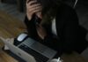 Work Stress Linked to Rising Sick Leave and Mistakes A stressed-looking woman working at a laptop.