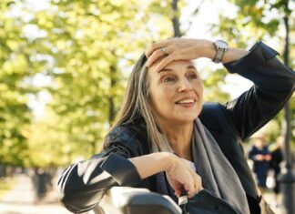 UK’s ‘First Evidence-Based Menopause Workplace Toolkit’ Launches a person with the hands on the head